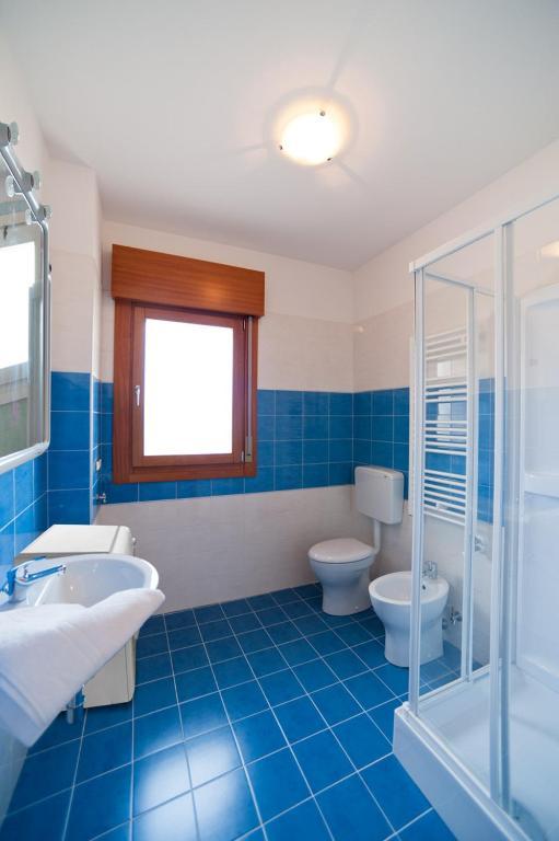 Residence Galleria Gran Mado Caorle Pokoj fotografie